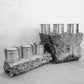 Group image of flure's medium sized travel tin collection in different scents.