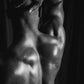 Candle scent image for the fragrance figure. Picture of a black male models back to depict the masculine sexy scent.