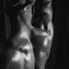 Candle scent image for the fragrance figure. Picture of a black male models back to depict the masculine sexy scent.