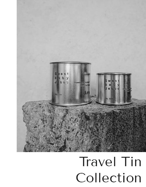 Image of flure's high end travel tin collection in raw metallic silver tins. Featuring 2 different sizes of the fragrance scent sweet baby Jesus.